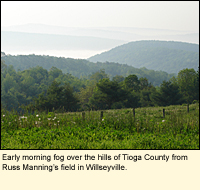 Early morning fog over the hills of Tioga County (New York) from Russ Manning's field in Willseyville.
