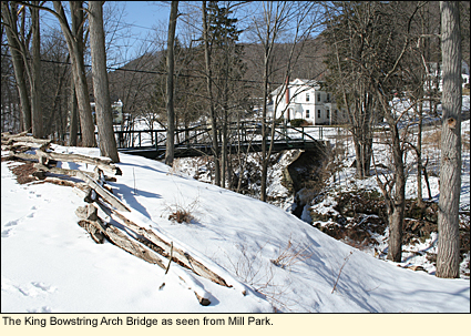 The King Bowstring Arch Bridge as seen from Mill Park on Main St. in Newfield, New York USA.