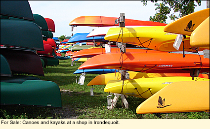For Sale: Canoes and kayaks at a shop in Irondequoit in the Finger Lakes, New York.