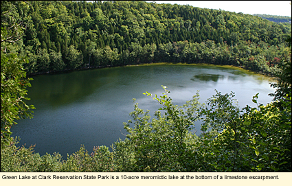 Green Lake at Clark Reservation State Park is a 10-acre meromictic lake at the bottom of a limestone escarpment.